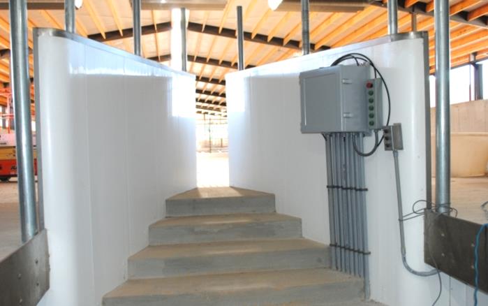 Extrutech pre-finished, stay-in-place concrete FORM panels used as the walls of a Milking Parlor.
