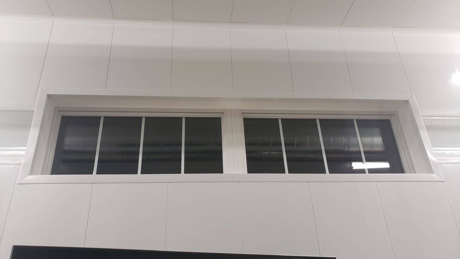 Window using Extrutech trim and wall panels.